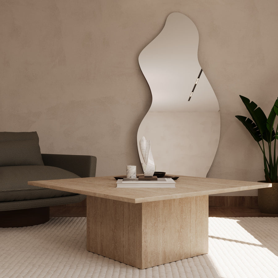 Square travertine coffee table by The Gallery Home