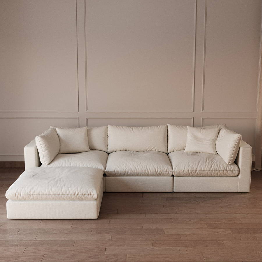Modular sofa with matching ottoman by The Gallery Home