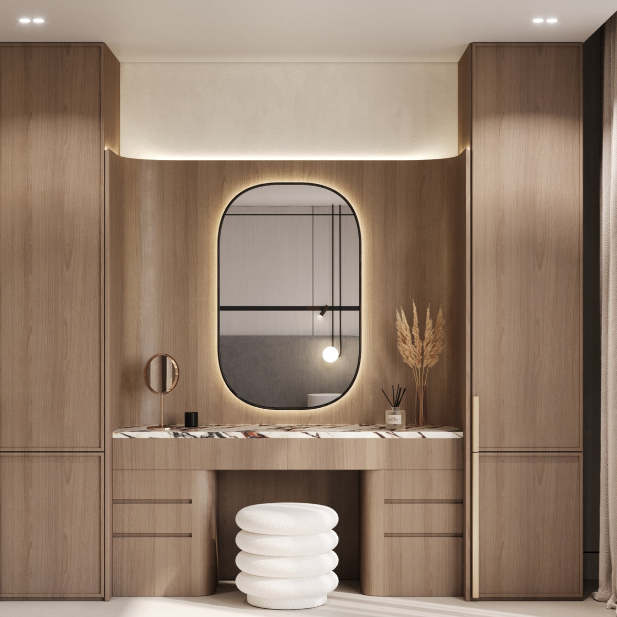 Bespoke walnut dressing area with lit mirror and marble vanity by The Gallery Home