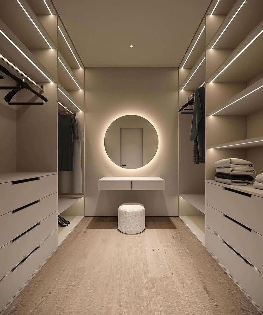 Bespoke walk-in wardrobe with integrated lighting by The Gallery Home
